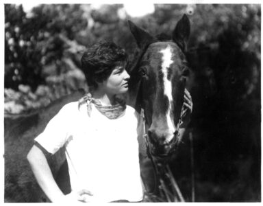 Sylvia with her horse Jimmy on Kapiti Island