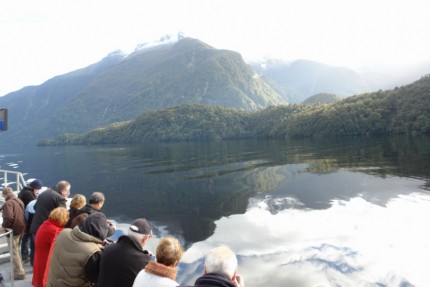 A few passengers on board the Fiordland Explorer seeking dolphins..