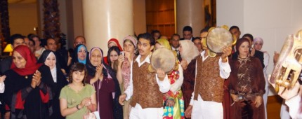 Wedding guests welcome bride and groom