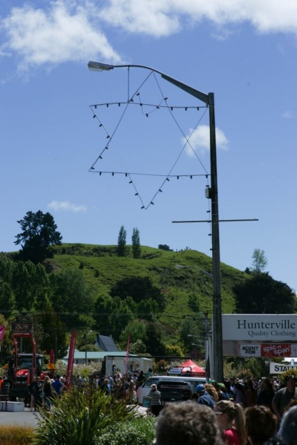 Look carefully - the race is up the hill, then along the ridge, down a mud slide, through a creek and back to the main street obstacles.