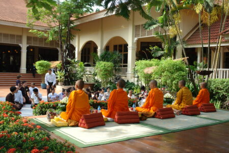 Monks blessing staff and patrons at the Sofitel Angkor Phokeethra, Sein Reap, Cambodia as part of the Cambodian National day celebrations