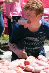 Along the way one has to grab a bull's testicle in the mouth - err no hands allowed